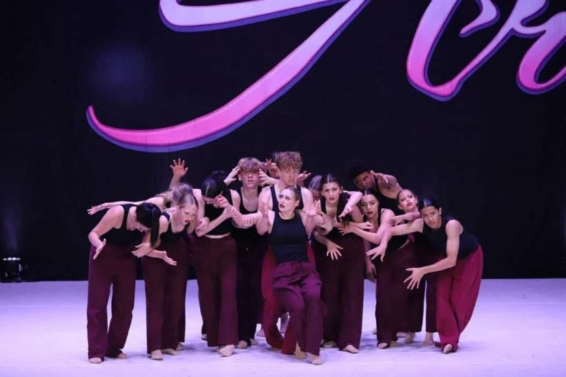 A contemporary dancer mid movement
